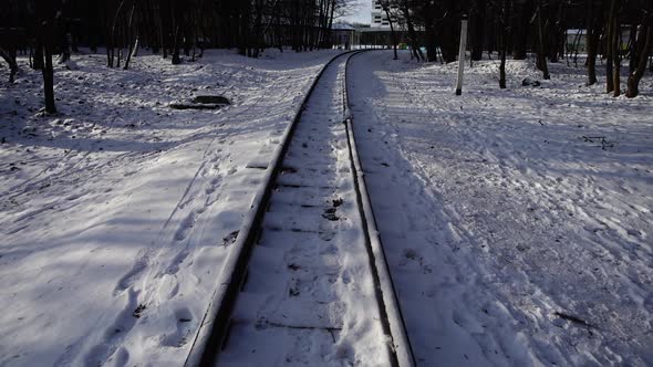 Railway rails covered with snow.