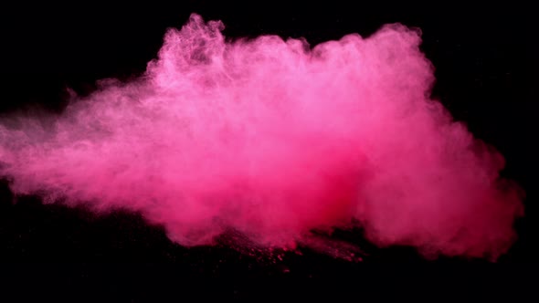 Super Slowmotion Shot of Pink Powder Explosion Isolated on Black Background