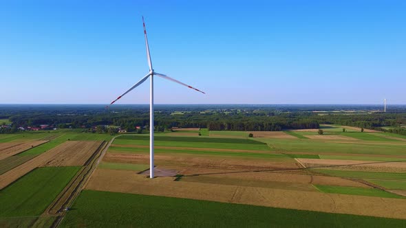 Zoom View of Wind Energy Turbine From Drone