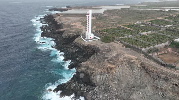 Lighthouse Look Out Tower Structure at Rocky Cliff Coast Atlantic Ocean Sea Line