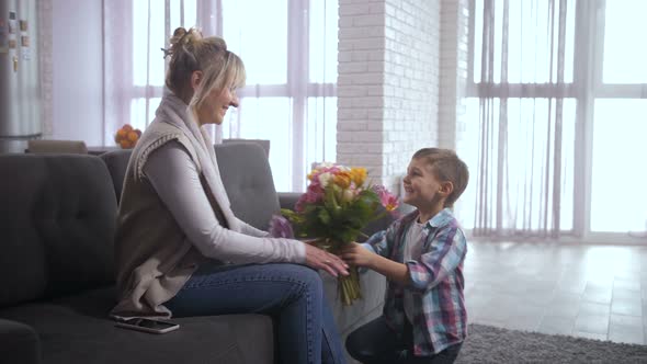 Loving Son Congtatulating Mom with Women's Day