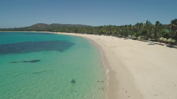 Seascape with Beach and Sea, Windmills. Philippines, Luzon