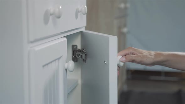 Woman Hand Open Drawer Bathroom New Furniture Close Up