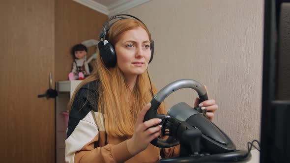 Woman Playing Computer Races