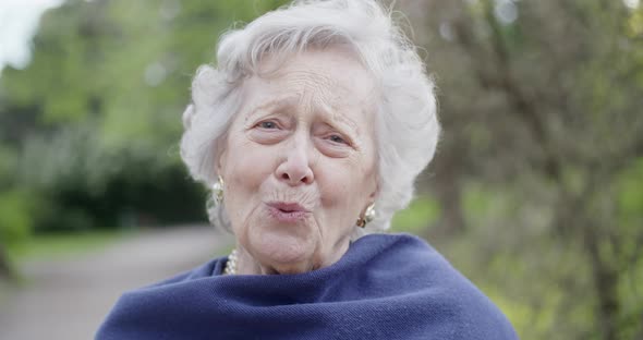 Senior Smiling Woman Portrait at Park