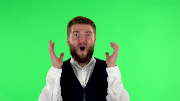 Surprised Man with Shocked Face Expression. Green Screen