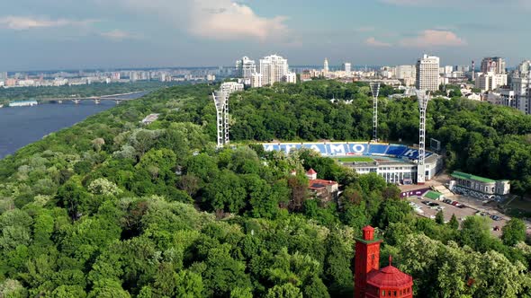 Beautiful flight from above over the capital of Ukraine Kiev. Top view of the football stadium.