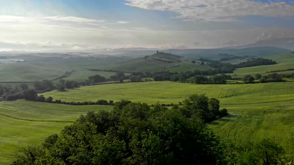 Classical Tuscanian Landscape During Spring. Tuscany, Italy. Plains Aerial Shot