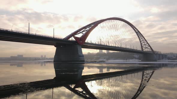 Bottom View of the Bugrinsky Bridge Against the Background of the Sunset Sky