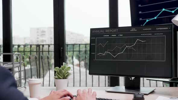 Revealing Shot of Businessman in Formal Suit Working on the Computer