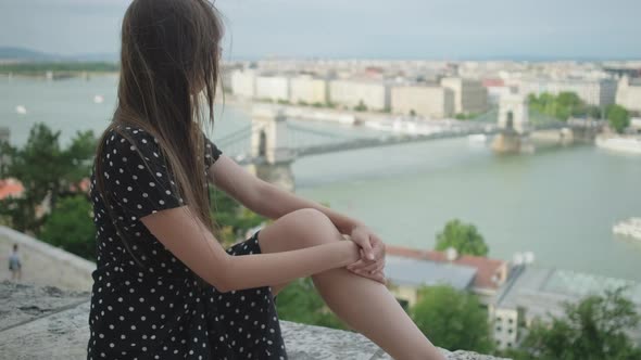 Girl Looking at Budapest Cityscape in Solitude Hungary