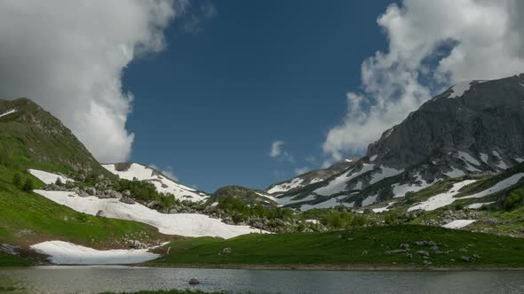 Lake Psenodakh Among the High Mountains