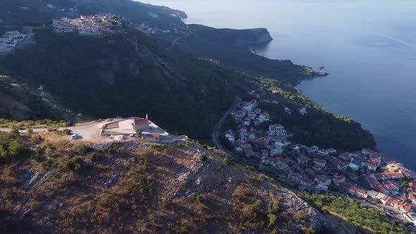 Flight Over Mountain Valley on the Coast alt