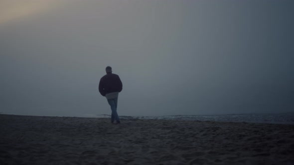 Thoughtful Guy Looking Sea Landscape at Misty Morning