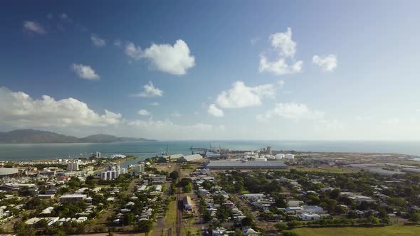 Drone footage showing the industrial and port area of Townsville, Australia. Magentic Island can be