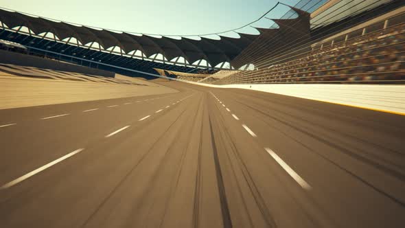 POV Race Car Speeding Along The Curve Racetrack on stadium during sport event.