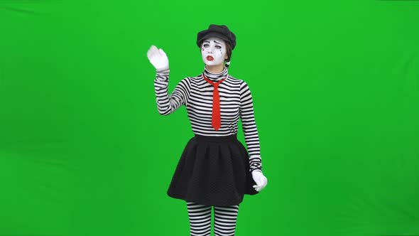 Mime Girl Choosing Something on Big Touch Screen