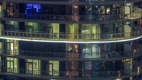 Big Glowing Windows in Modern Residential Buildings Timelapse at Night