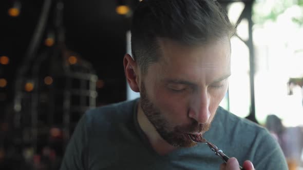 Man Eating Food, Meat Steak In Restaurant Closeup