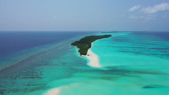 Aerial top down nature of paradise coast beach break by blue ocean and white sand background of a da