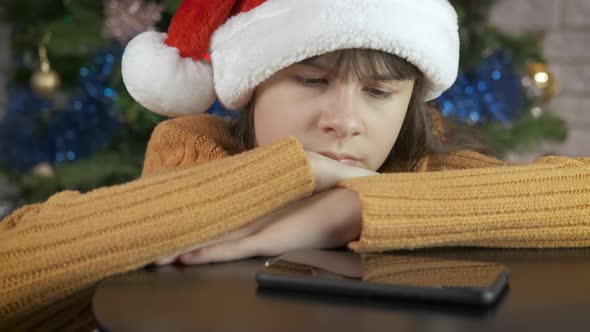 Teen with a Telephone Call at Christmas