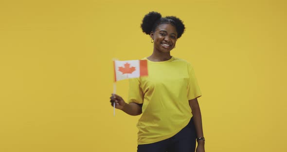 Woman Waving Canadian Flag