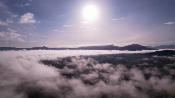 Drone view flying over sea of mist or fog Landscape High angle view