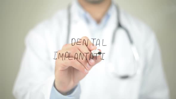 Dental Implantation, Doctor Writing on Transparent Screen