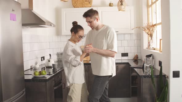 Beautiful Married Couple Dancing at Home.