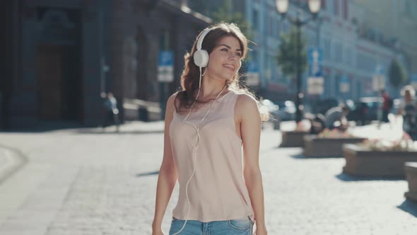 Smiling girl with headphones