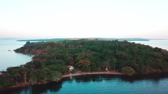 Lateral drone movement showing the resort of Banda Island (Archipelago Ssese Islands) - Victoria Lak