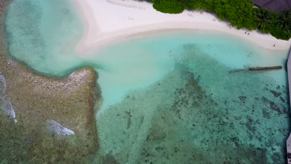 Drone aerial texture of marine bay beach break by blue sea and sand background