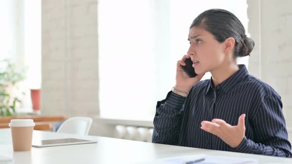 Angry Young Indian Woman Talking on Smartphone 