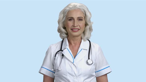 Happy Female Doctor Looking at Camera