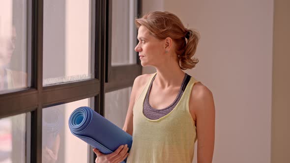 Cheerful Female on Yoga Class