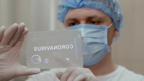 Doctor Uses Tablet with Text Coronavirus