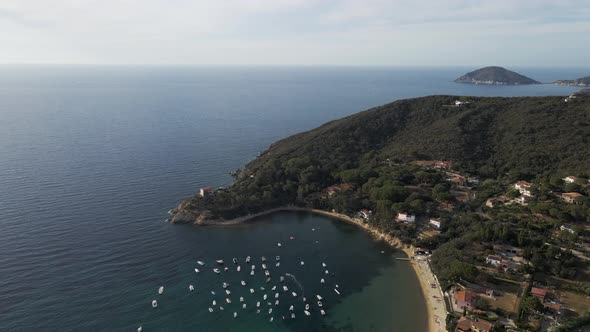 Aerial view of a small bay in Procchio along the coast on Elba Island, Italy.
