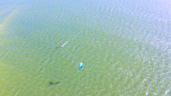 Aerial view of kitesurfing on a hydrofoil board, Queensland, Australia.