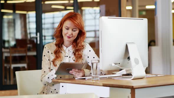 Businesswoman using digital tablet