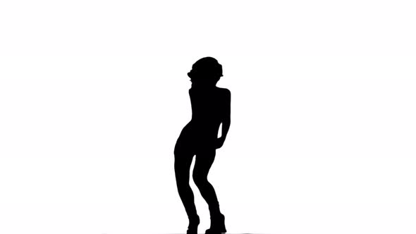 A Silhouette Woman Is Casually Dancing Against A White Background