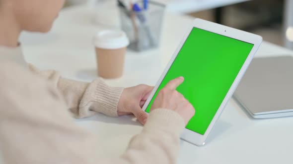 Woman Using Tablet with Chroma Screen