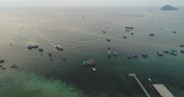 Thailand's Ocean Aerial Ships Boats Yachts on Waterfront at Koh Tao Island Pier Tanote Bay