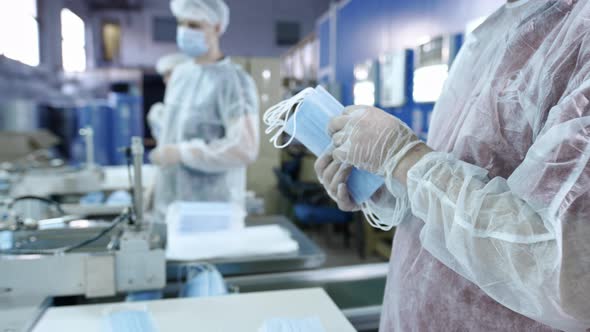 A Group of Workers From a Factory for the Production of Protective Medical Masks