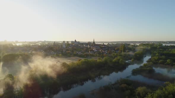 Sunrise and Fog Over the River Styr and the Historic Part of Lutsk Ukraine