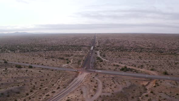 Orbiting aerial view of an intersection in the middle of nowhere