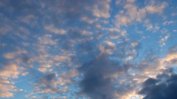 time lapse, beautiful clouds in the sun, sunset