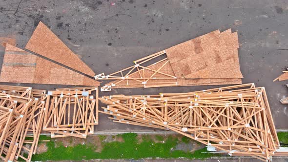 Wood Stacked on House Building Materials