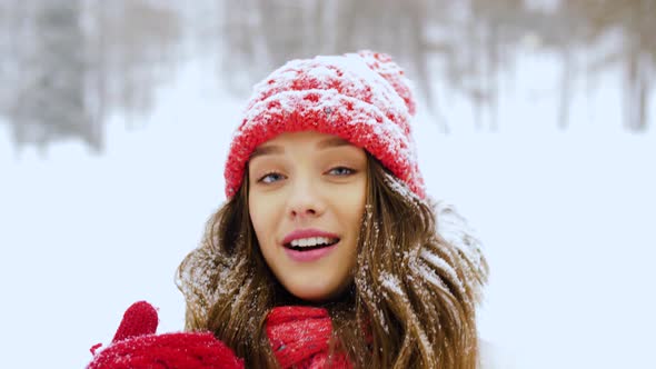 Young Woman Video Blogging in Winter Forest 3