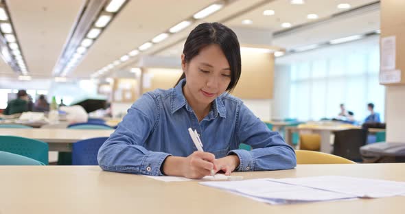 Woman study at library