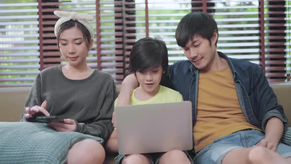 Asian family sit relax positive conversation with son, happiness smile boy casual talking